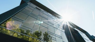 Office building with a sunny background.